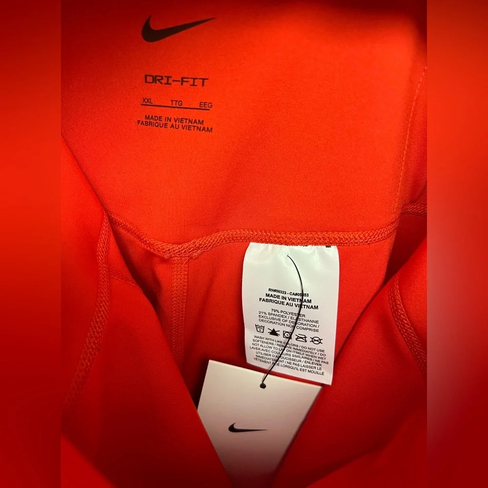 Nike Women's Red Shorts-XXL, tags, sun fade lines ( please see images).‎
